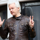 Julian Assange speaks to media from the balcony of the Ecuadorian embassy on May 19, 2017 in London, England